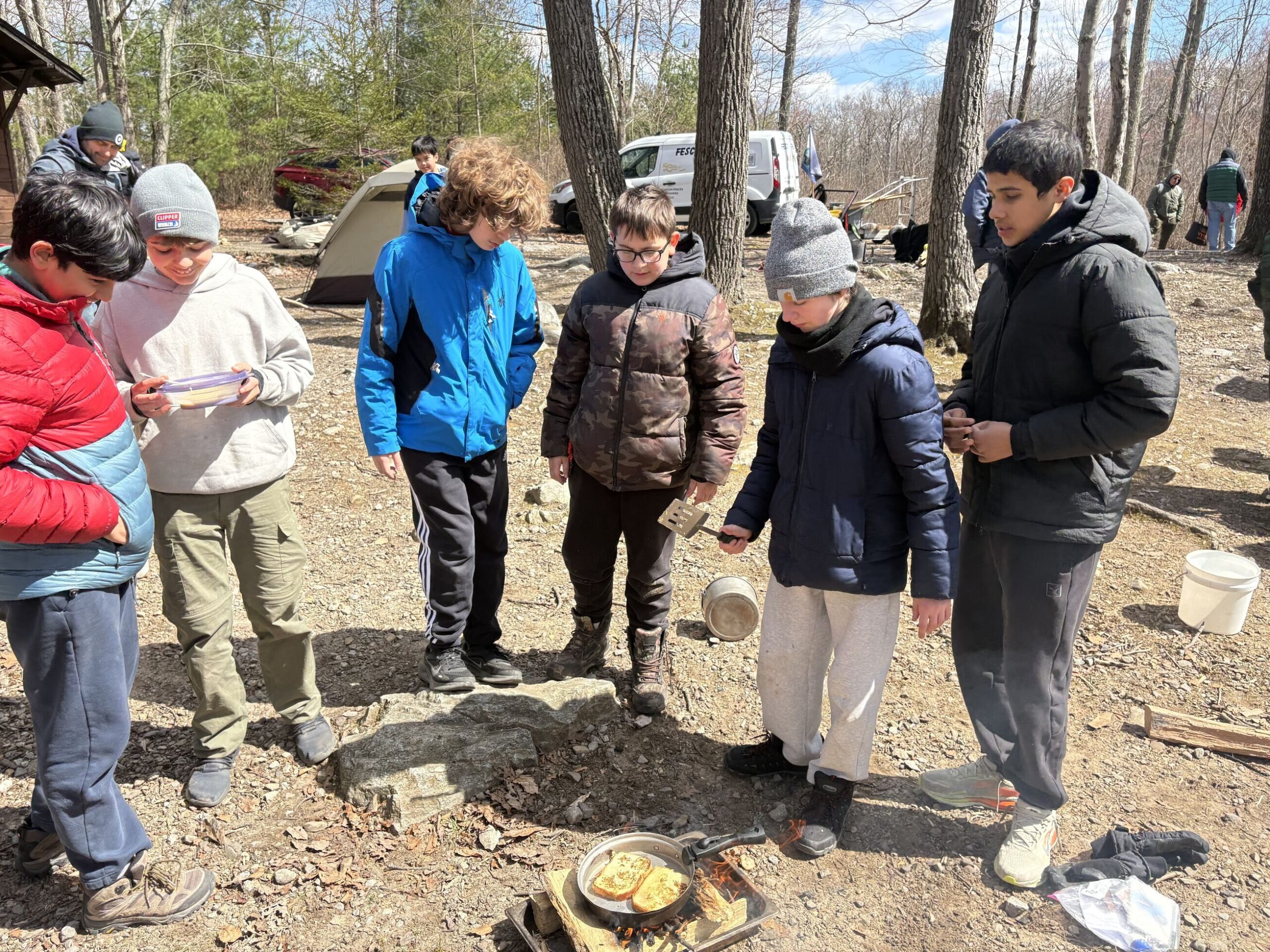 Scouts doing the cooking section of competion